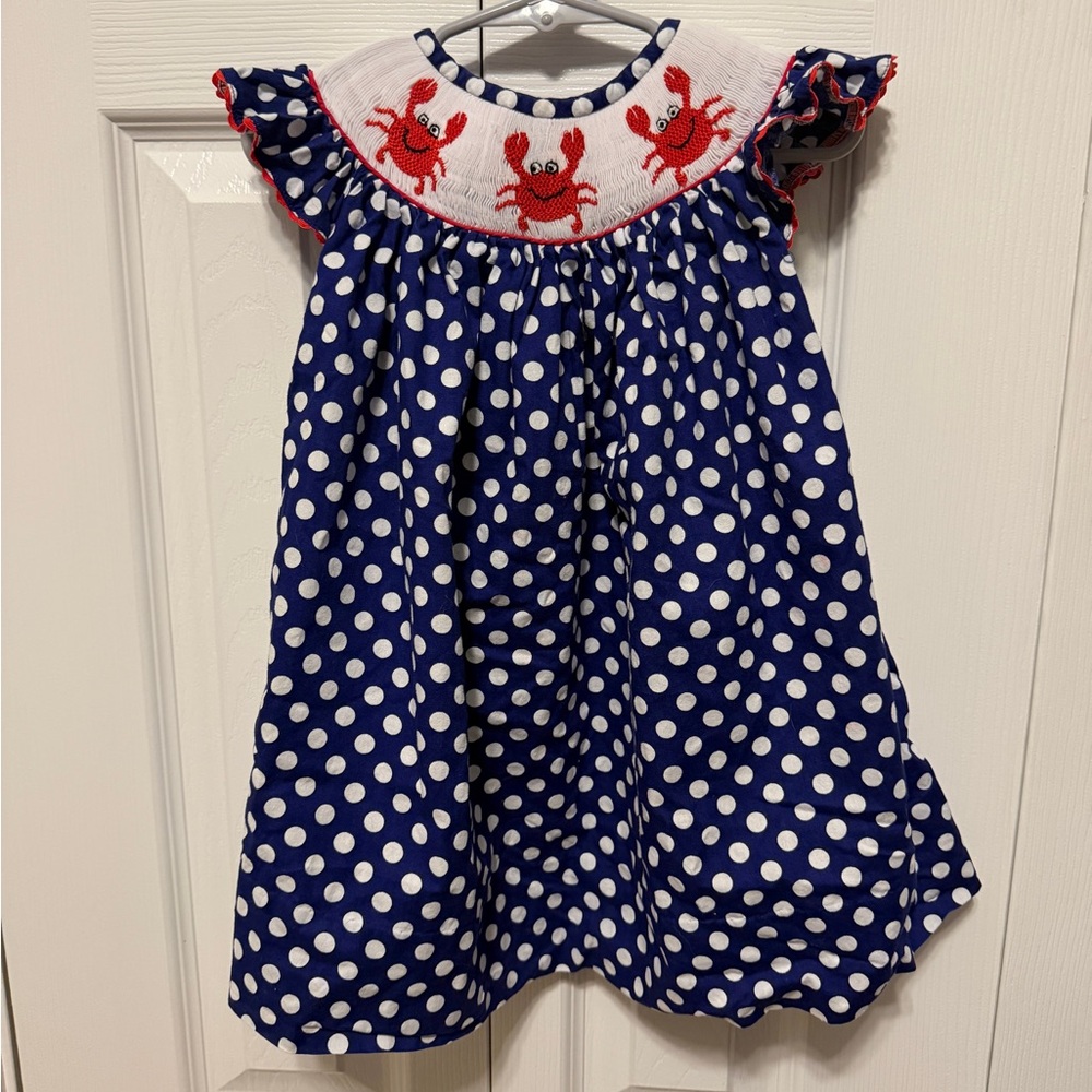 Navy Polka Dot Smocked Dress with Red Crab Embroidery